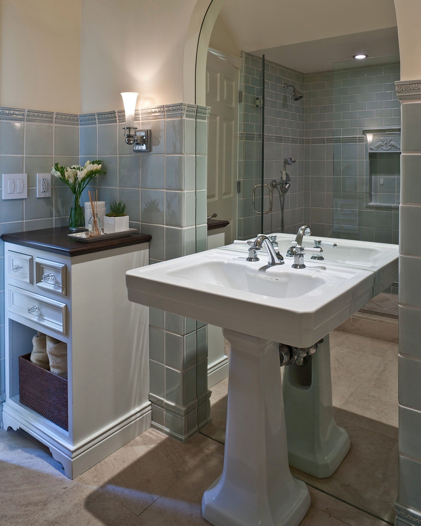 I have always loved the way this new Bathroom fits so effortlessly into an older, traditional home. It's all about scale and simplicity and details like the stained wood top on the cabinet.  Creating spaces that feel like they have always been a part