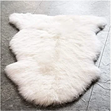 A lambskin rug on top of a tile floor.