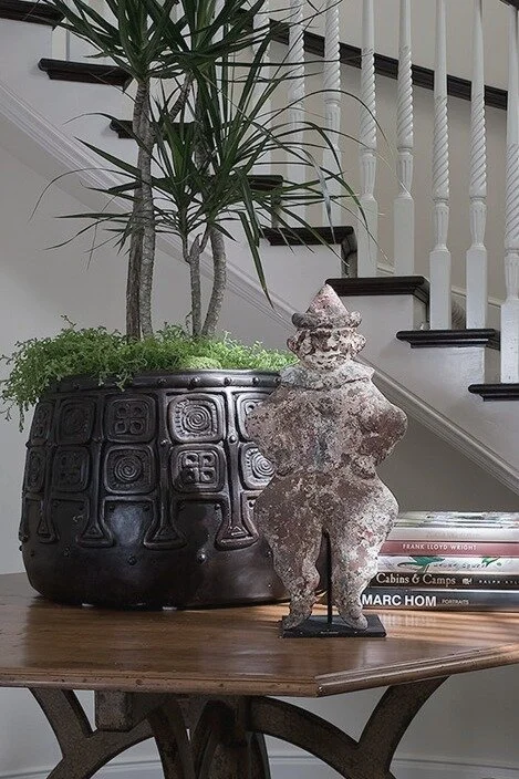 This Los Angeles entryway table injects humor with a fun, vintage knock-em as an accessory.