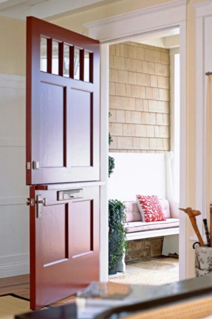 This home in Newport Beach is a classic American style and the red painted dutch door is exactly the pop of color that it needed.