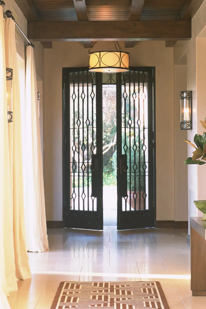 A Mediterranean style wrought iron front door.