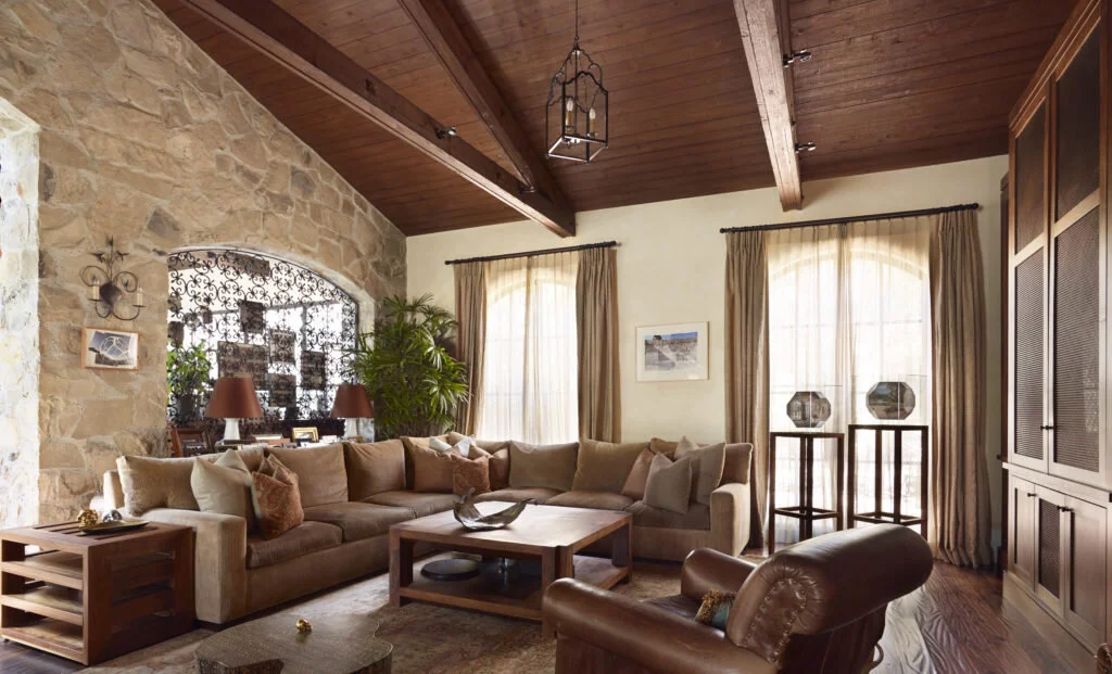 A wood beam ceiling is a great solution for a sloped ceiling. Trusses were used to provide more detail and make the ceiling feel more substantial.