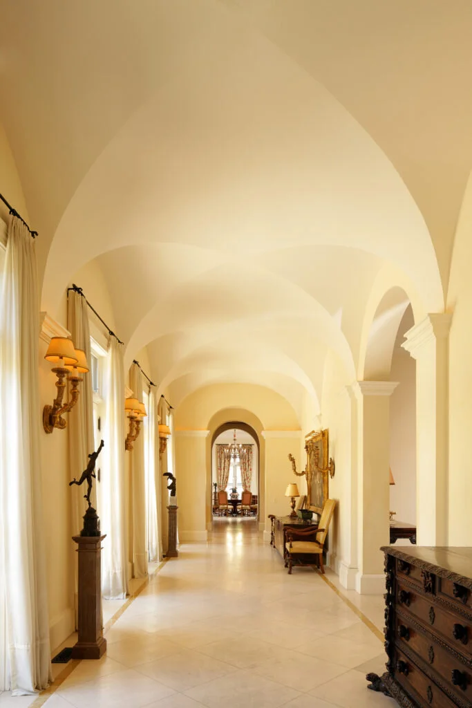 A groin-vaulted ceiling in a long hallway in a home in Beverly Hills.  The ceiling was inspired by old Tuscan villas.