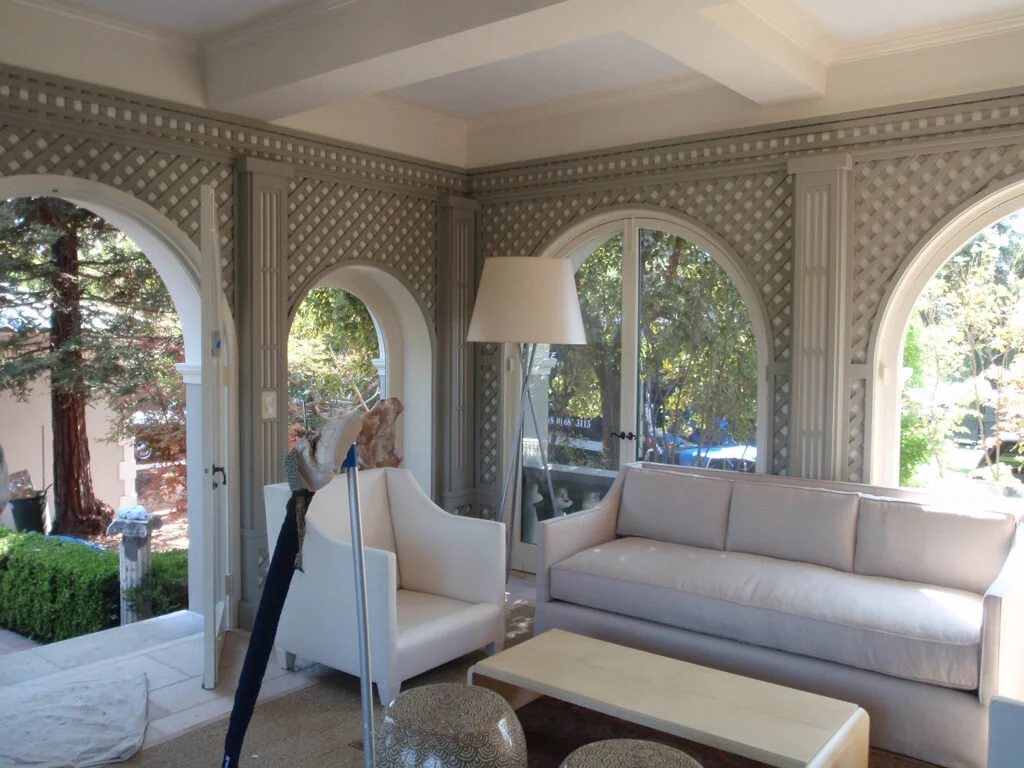 This is an image of the room almost complete. You can really see how the lattice has accentuated the architecture of the room and made a nice, well lit space into a dramatic garden room with a true sense of place.