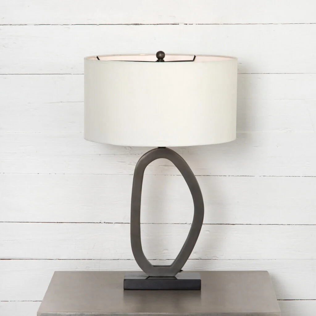 This organic keyhole lamp features an organic oval shape in dark gray.